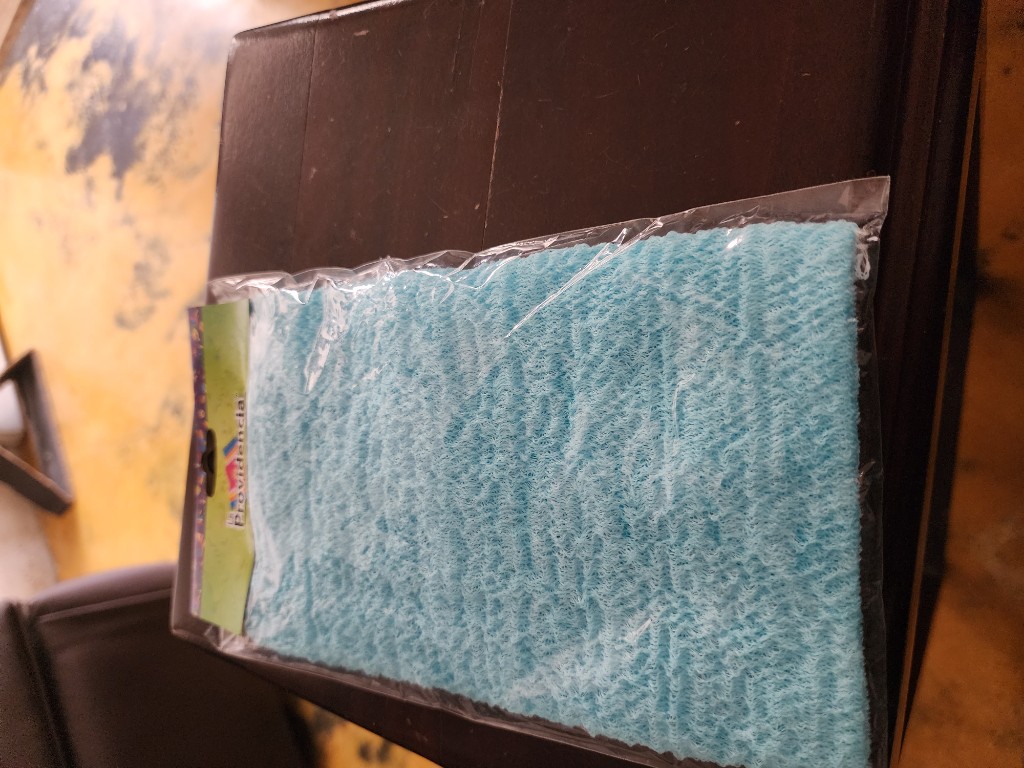 Paño exfoliante para baño