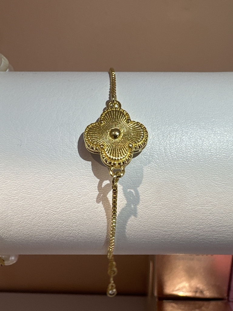 Pulsera dorada floral