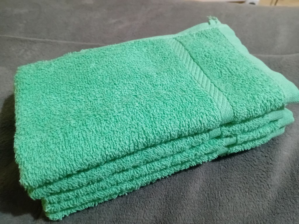 Toalla verde higiene personal