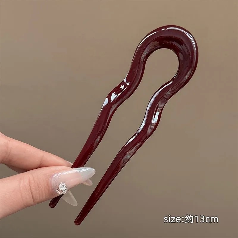 Pinza para el cabello vino
