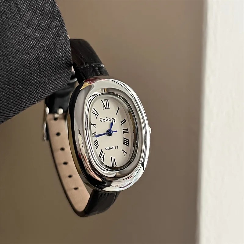 Reloj vintage de correa con esfera plata