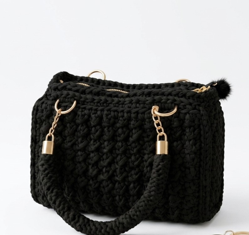 Bolso negro elegante tejido