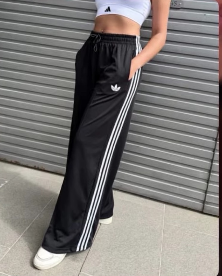 PANTALON ADI NEGRO CON BLANCOM