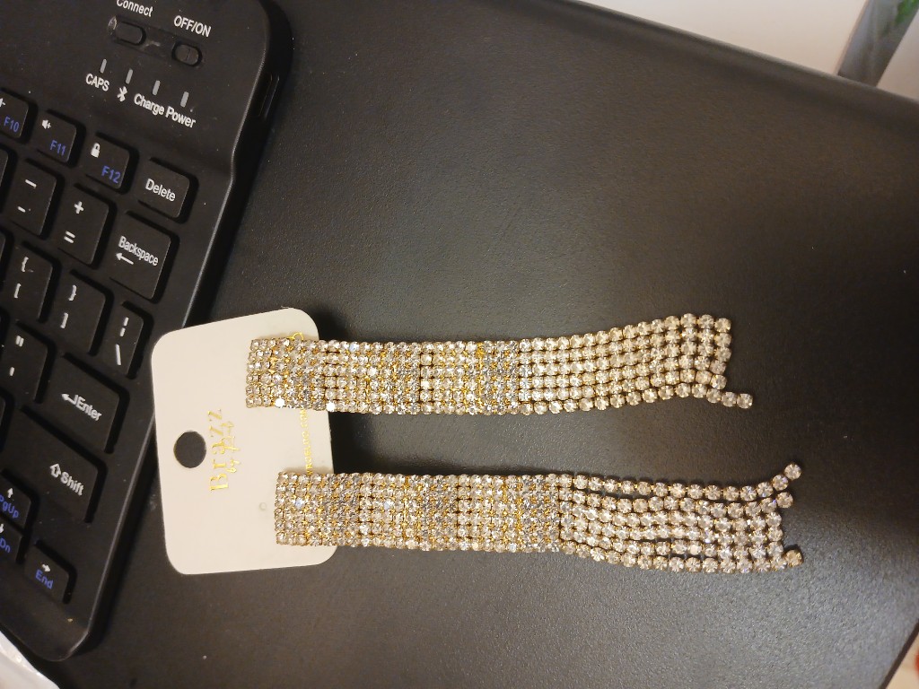Aretes brillantes dorados