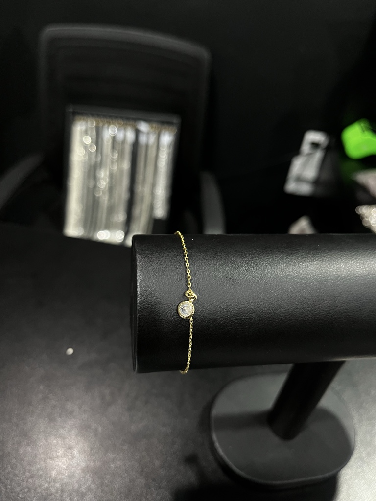 Pulseira feminina ponto de luz (Banhado a ouro 18k)