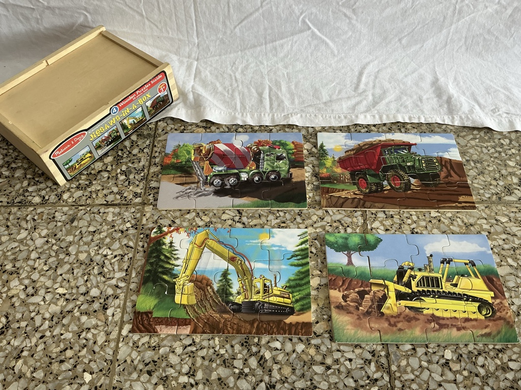 Melissa & Doug Jigsaw in a Box vehículos