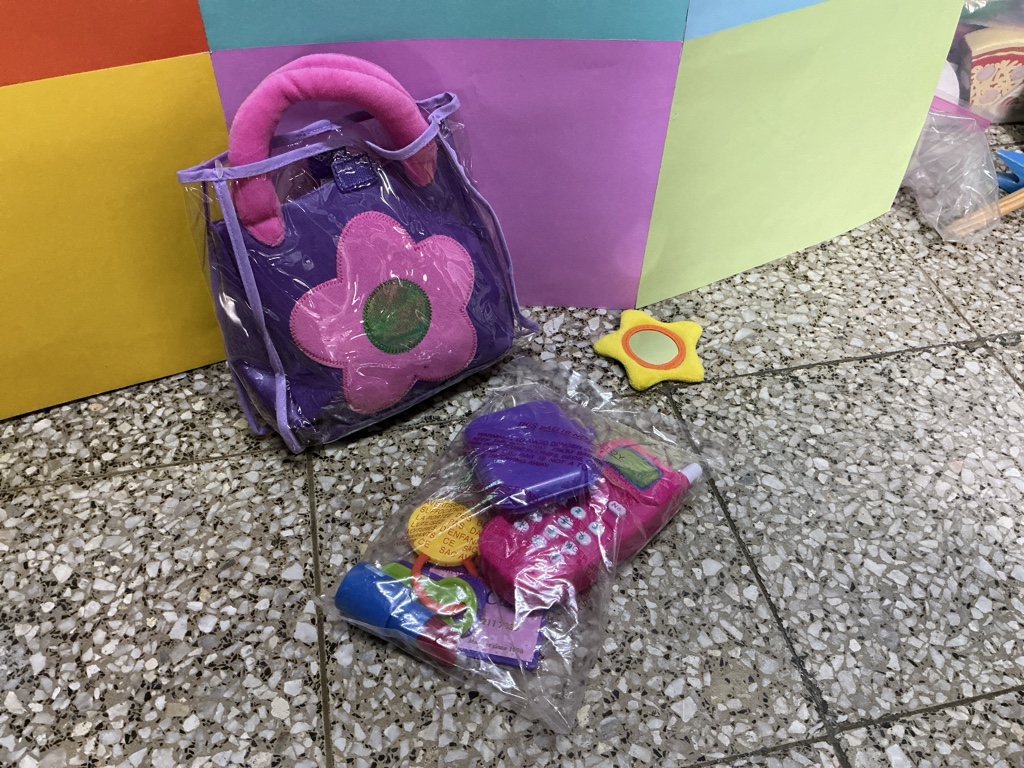 Bolso morado de bebé