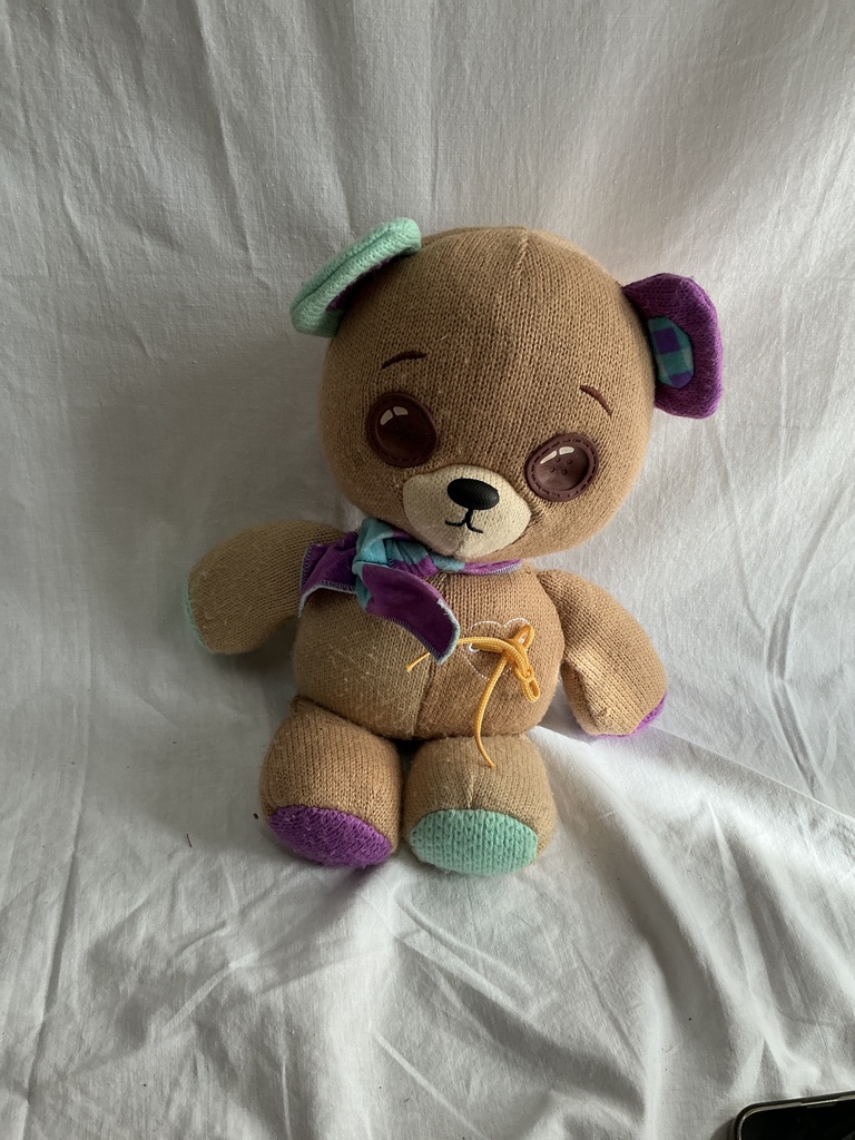 Peluche oso cafe interactivo con movimiento en ojos