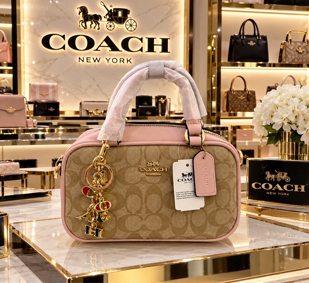 Coach bolso rosa y beige