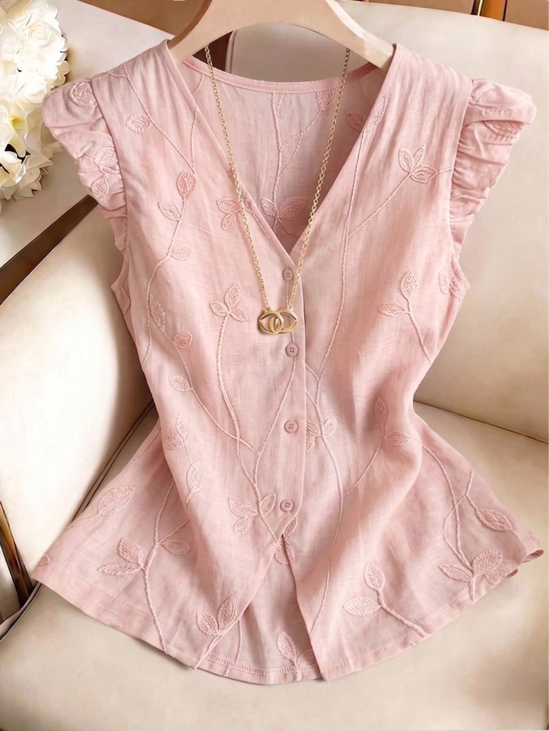 Blusa rosada con detalles tejidos
