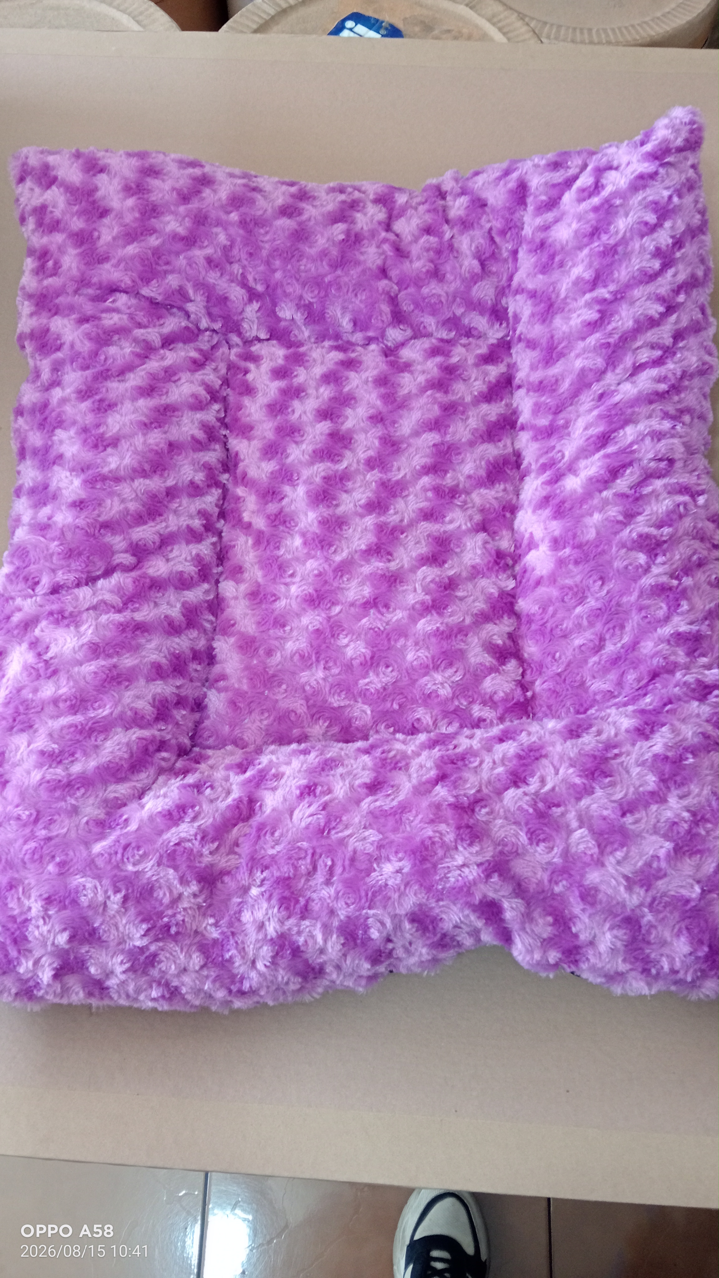 Cojín morado peluche
