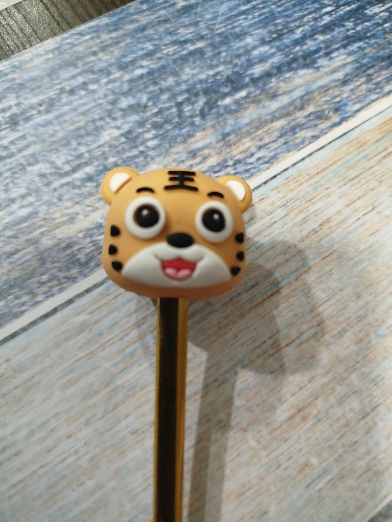 010	CUCHARA TIGRE
