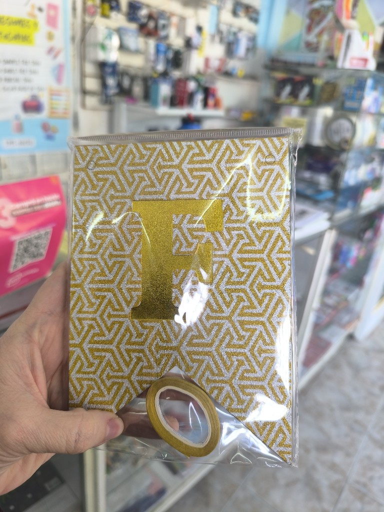 Banderin dorado brillos