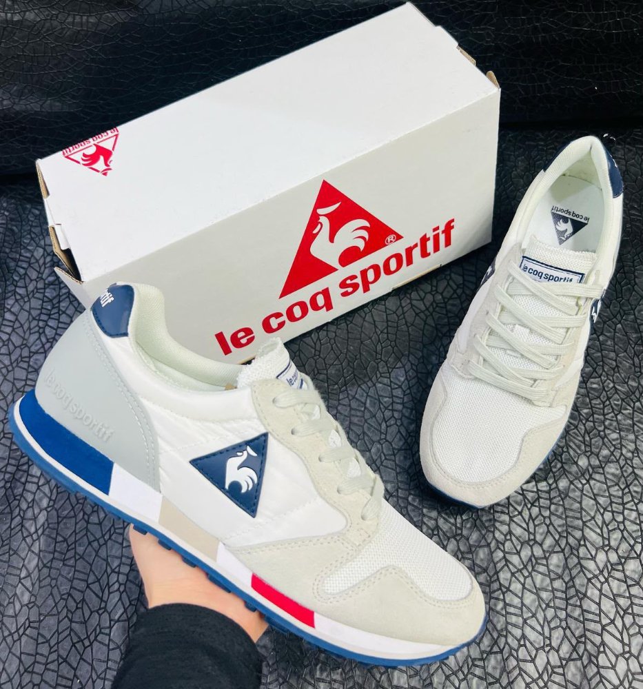 Le Coq Sportif blanca y azul