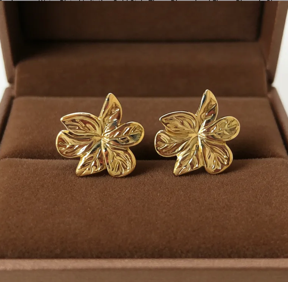 Aretes flores doradas 2