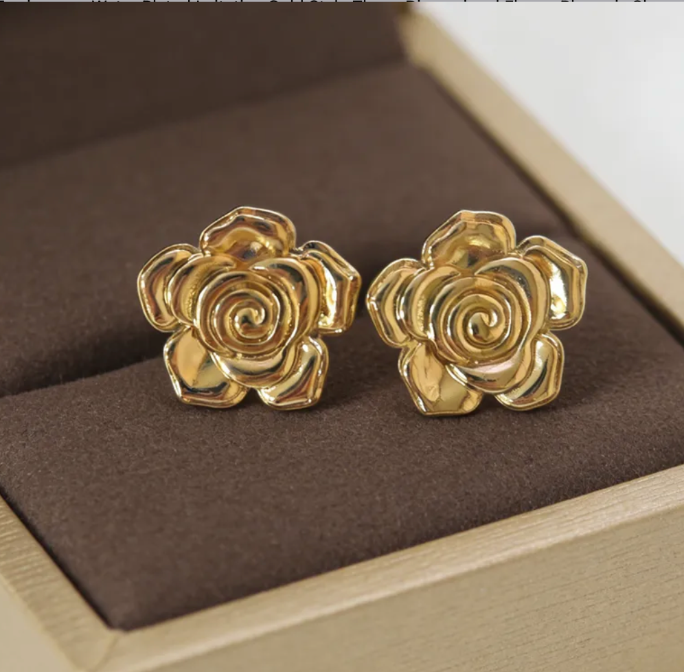 Aretes flores doradas