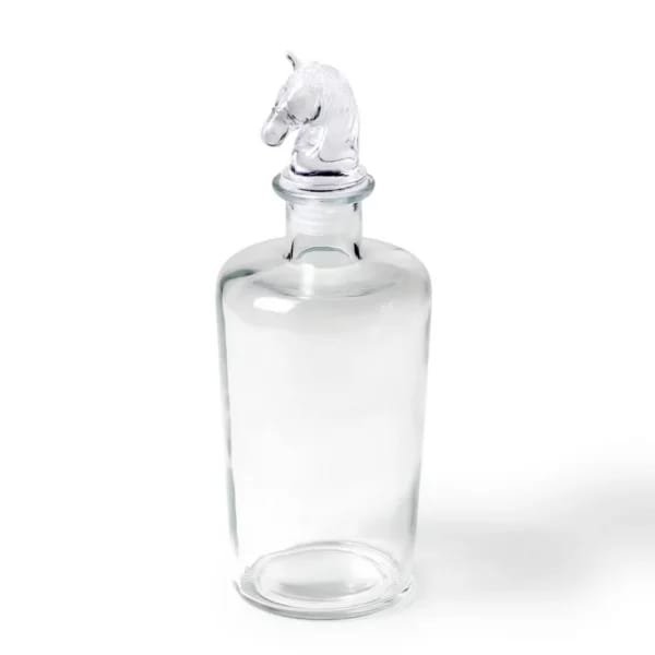 botella de vidrio con tapon en forma de caballo