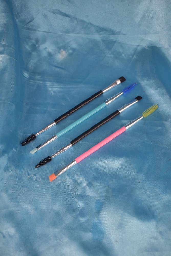 Brocha doble de cejas surtida
