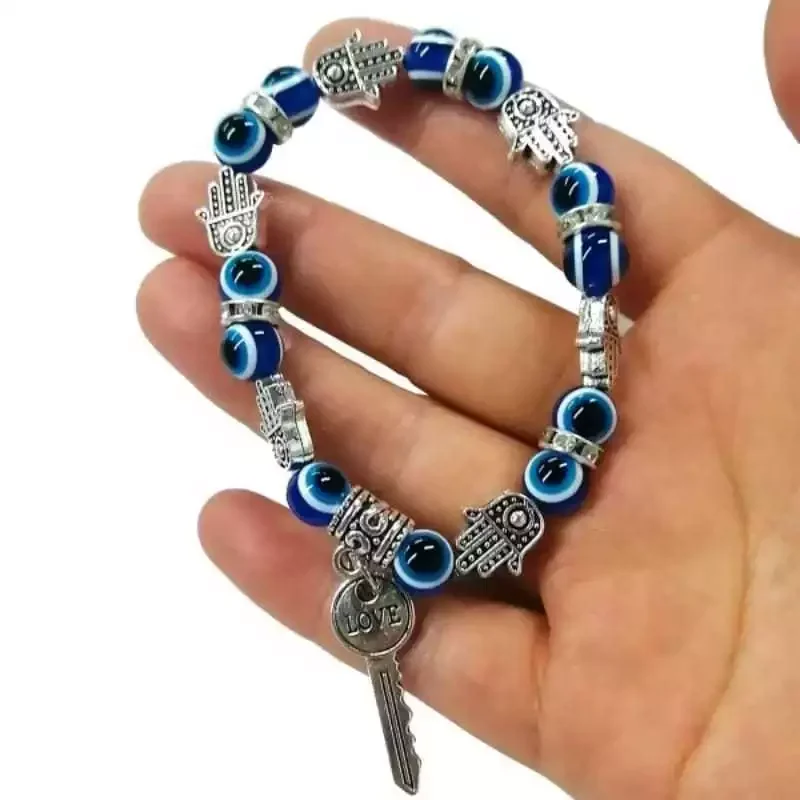 PULSEIRA CONTAS OLHO GREGO COM MÃO DE HANSA