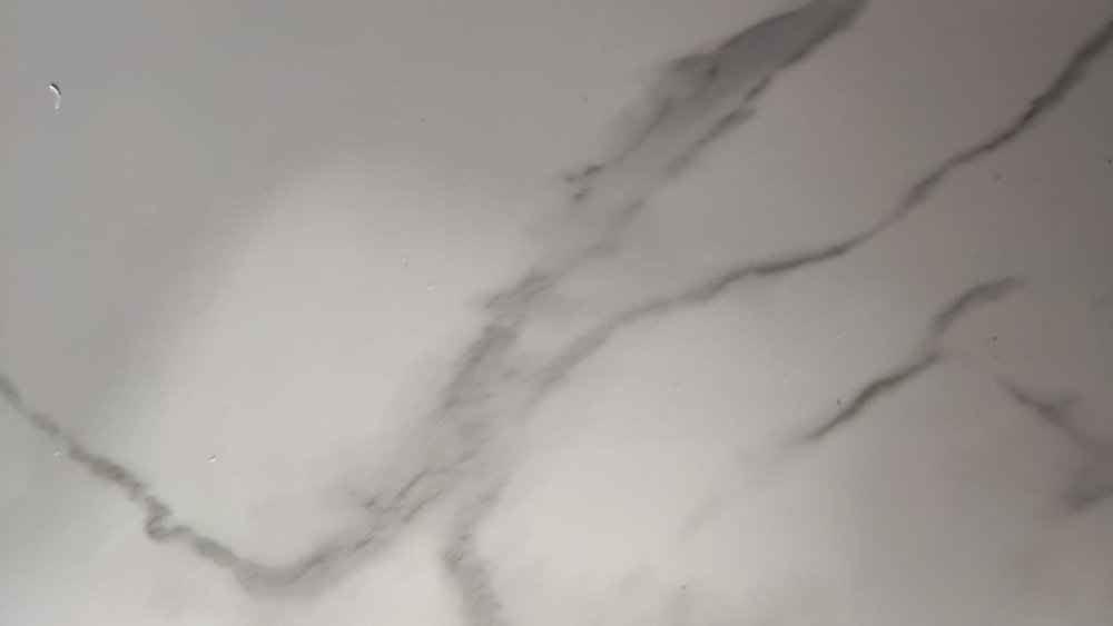PVC MARMOL RAYOS GRIS 122X244