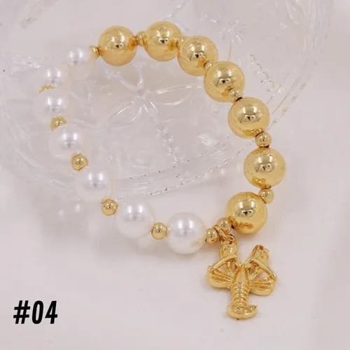 PULSERA DORADA Y PERLA