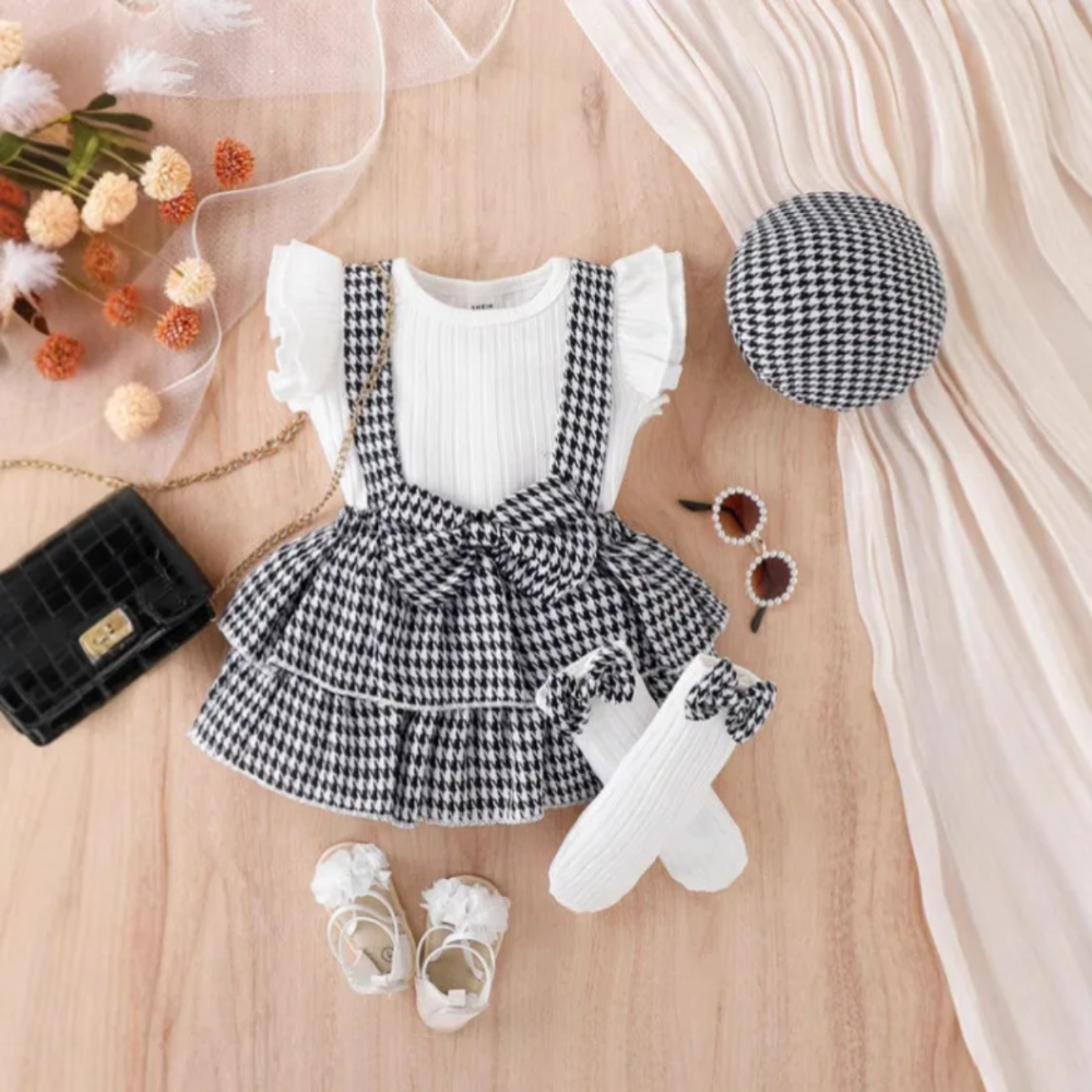 Conjunto de braga, body, medias y sombrero