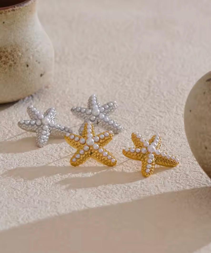Pendientes DP de estrella de mar detalle de perlas