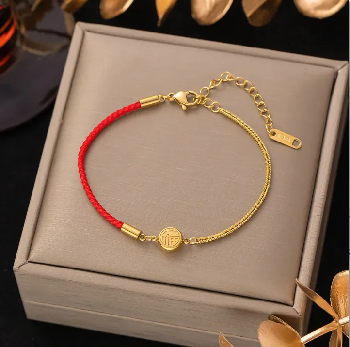 pulsera mitad tejido rojo y mitad acero inoxidable