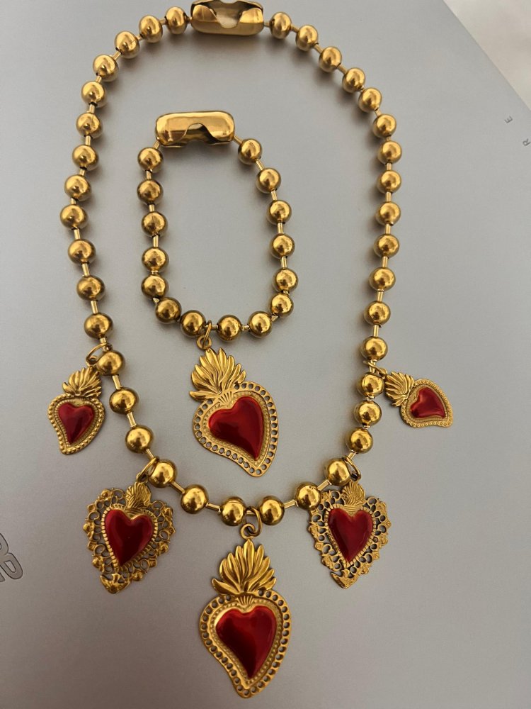 set de pulsera y collar de corazon de jesus