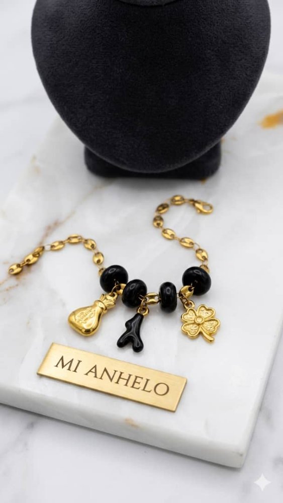 Pulsera de trebol y bolsita de dolar