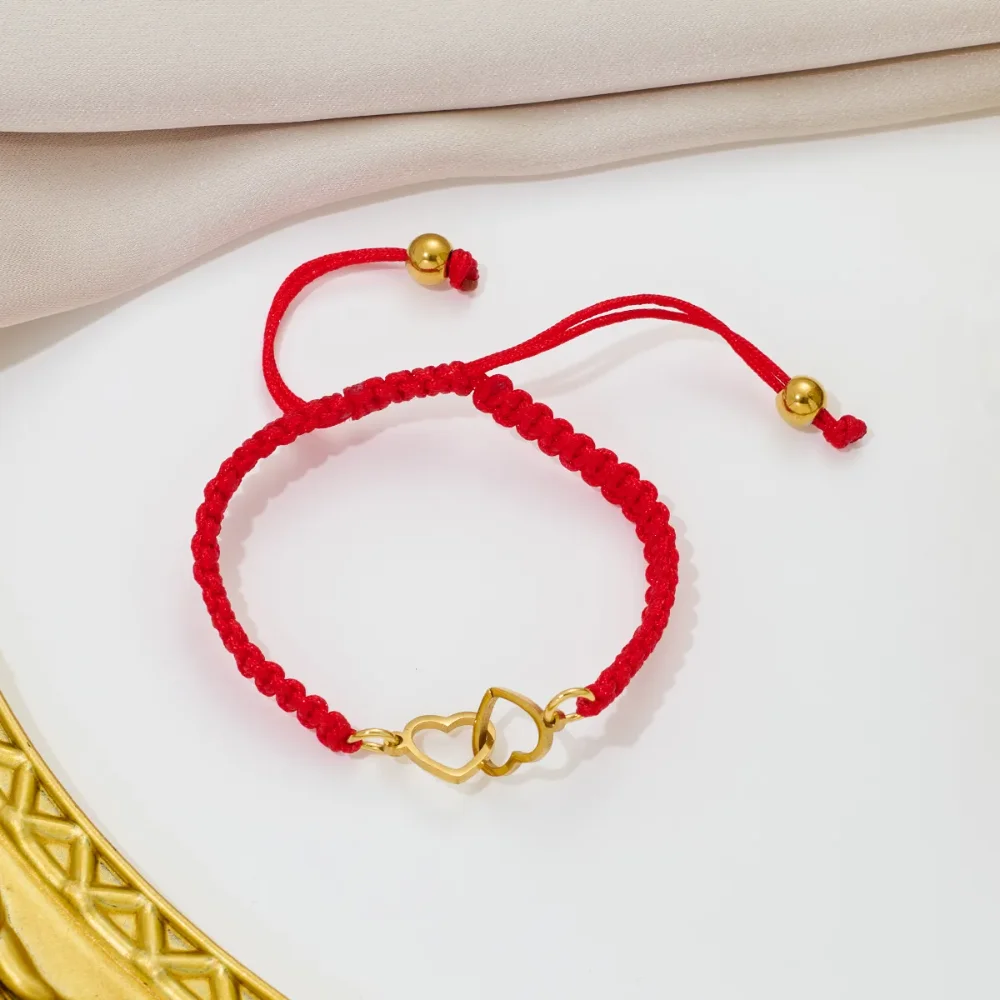 pulsera tejida de corazon entrelazado