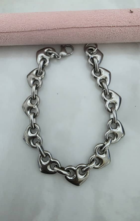 Pulsera de tejido Gucci en forma de corazon