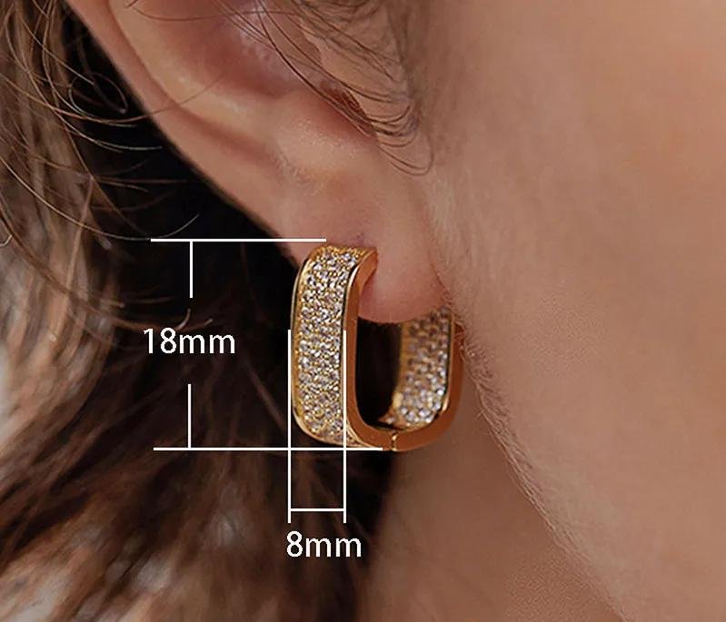 Aretes con circones dorados