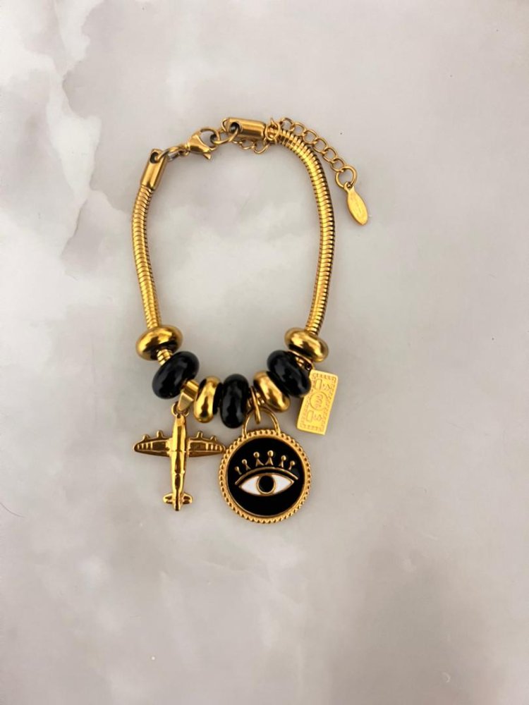 Pulsera con dije ojo negro, avion.dolar.