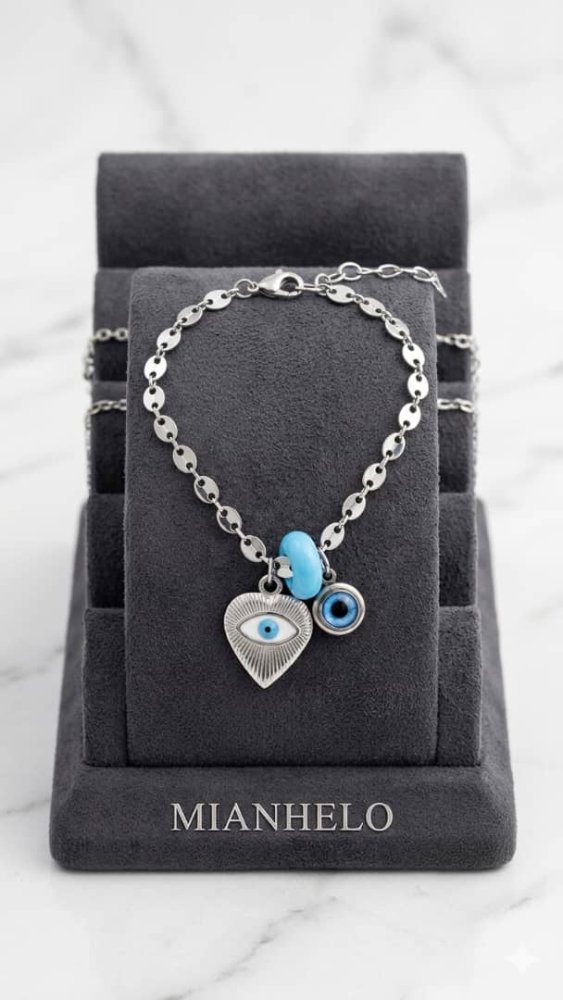 Pulsera gucci plateada con dos ojos turcos