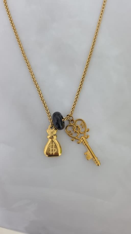 collar de saco de dolar y llave