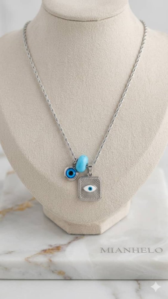 collar plateado con dos ojos