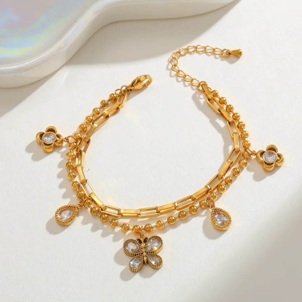 pulseras multidije de mariposa, luna y flor