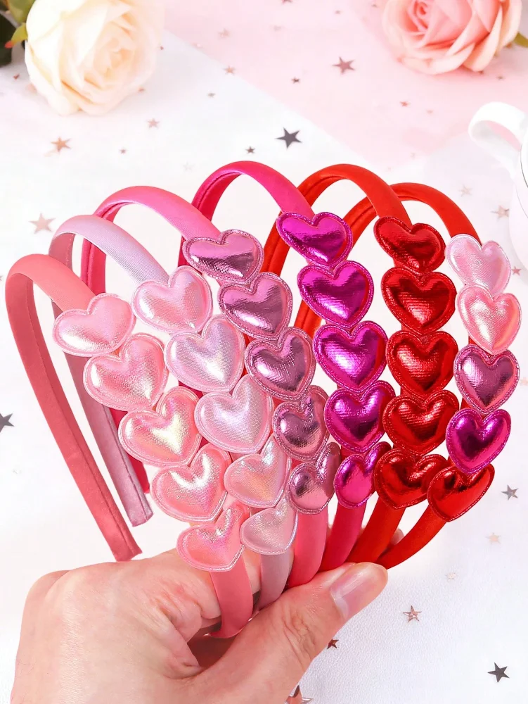 Cintillo de corazones brillantes rojo, fucsia y rosa