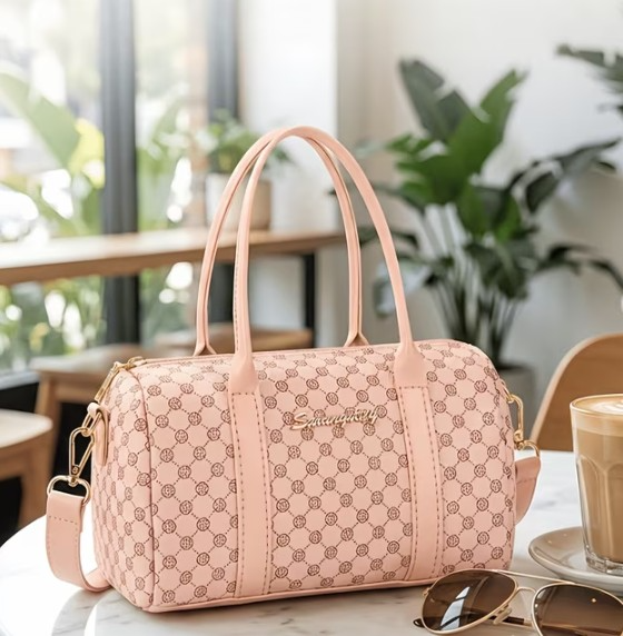 Cartera rosada tipo baul