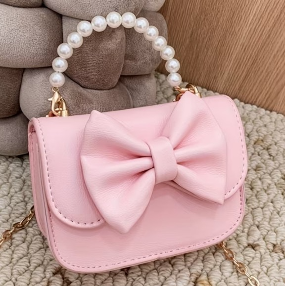 Mini Cartera Bandolero Rosada con Lazo
