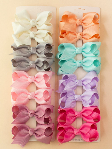 Paq de 4 pares de lazos doble con detalle de nudo colores varios