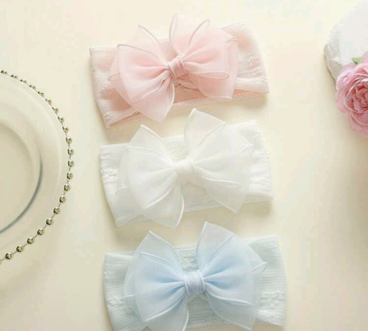 Cintillo de elastica suave para bebe con lazo de tul rosado, blanco y celeste