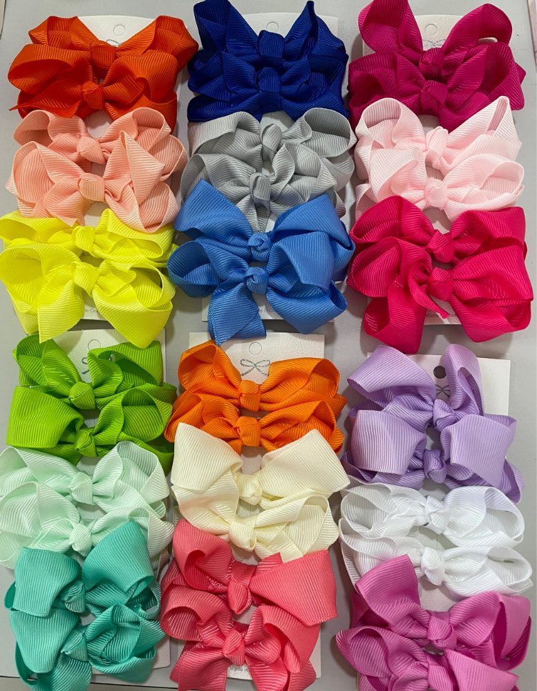 Par de lazos estilo burbujas colores varios de niña