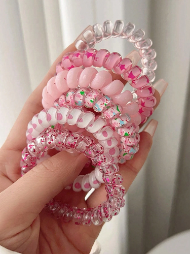 Set de 2 Colitas de espiral estampado en tonos rosados