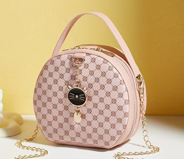 Mini Cartera Circular Bandolero Rosado, con detalle de gato