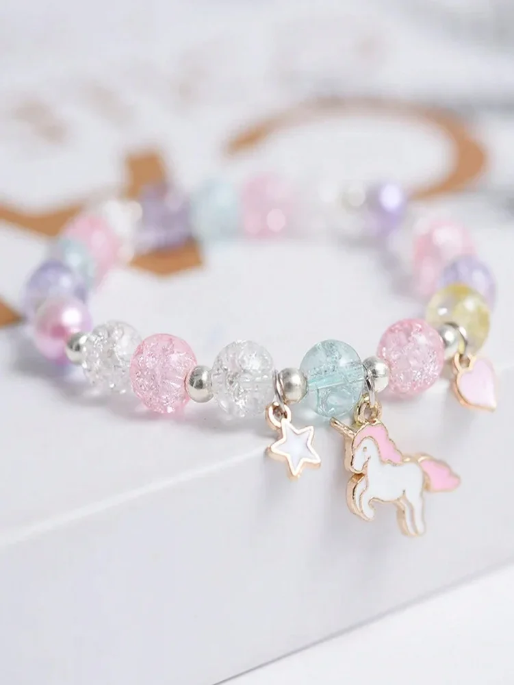 Pulseras estilo cristal delicado con dije de unicornio