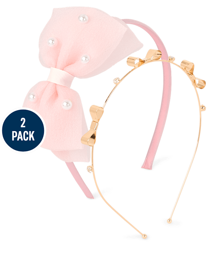 Set de Cintillo con lazo rosado y detalle de perlas y cintillo de metal dorado con 3 lazos
