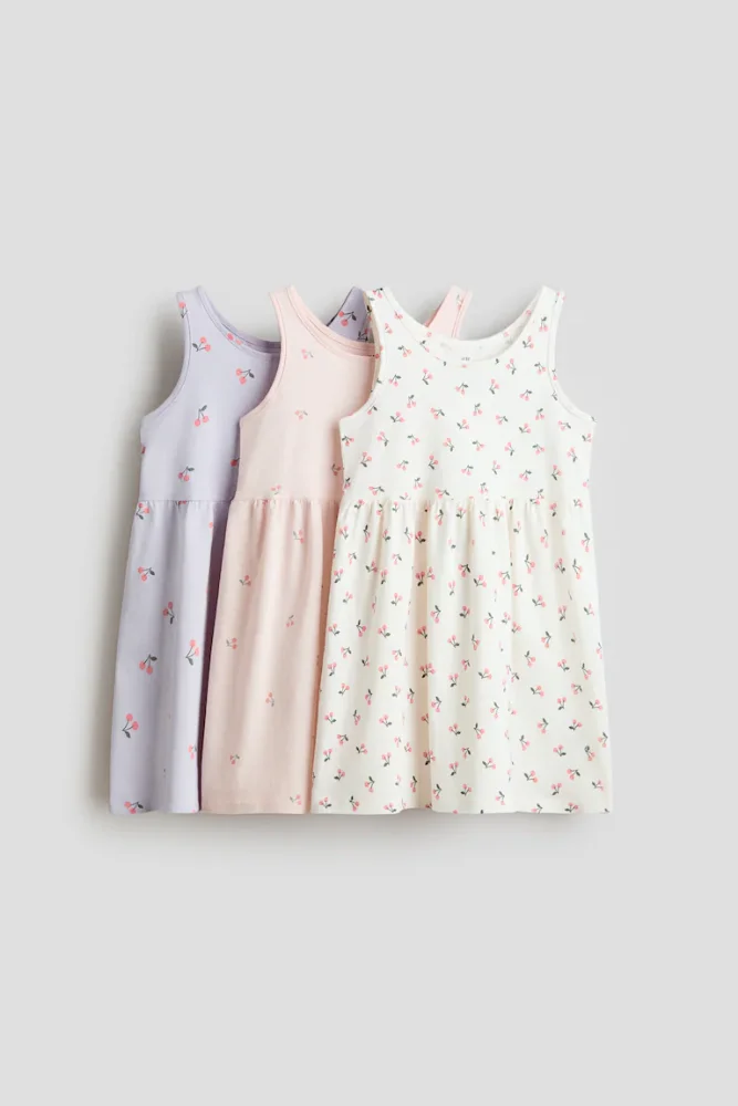 Vestido S/M por unidad (lila, rosado, crema con cherries) 6/7T