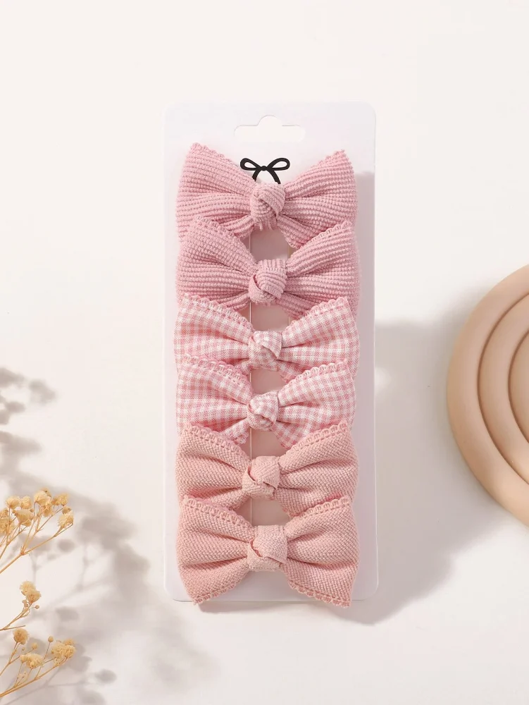 Set de 3 pares de lazos en tonos rosados
